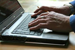 writting on lap top sm
